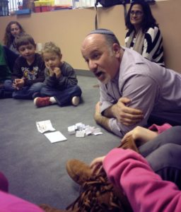 Rabbi Paul Kipnes with little kids